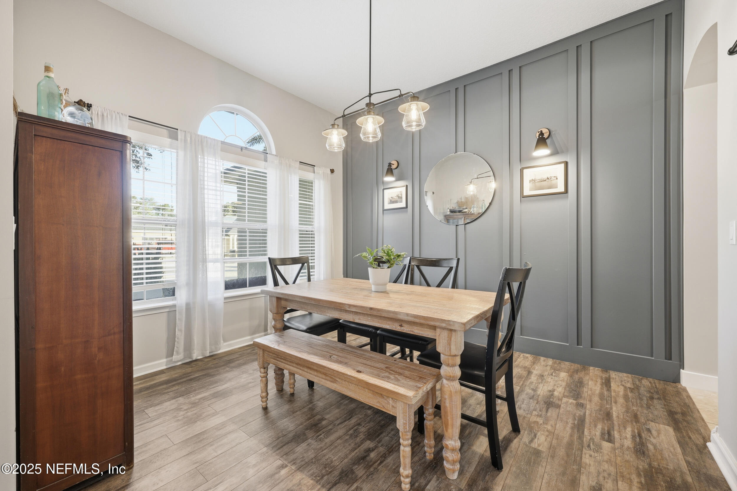 177 Summerhill Circle St. Augustine, FL 32086 - Photo 8 of 42 a view of a dining room with furniture window and wooden floor