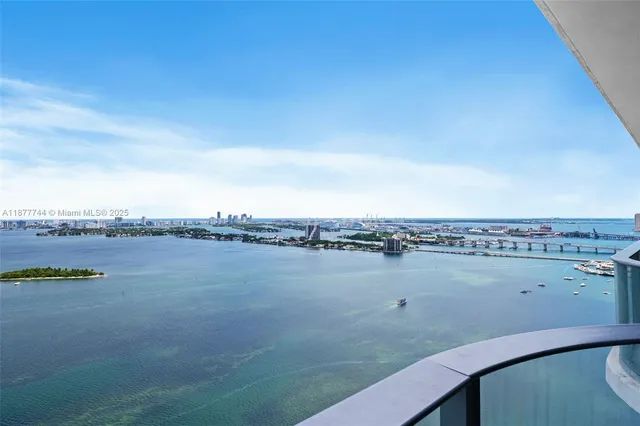 a view of a lake with a city view