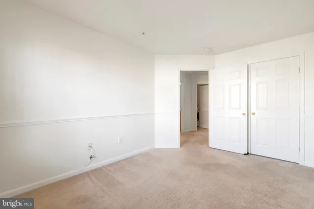 an empty room with closet
