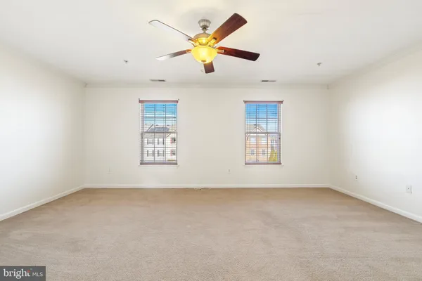 a view of an empty room with window