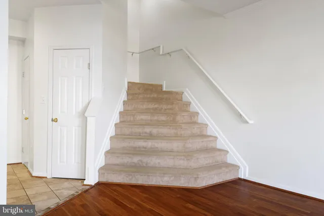 a view of entryway with wooden floor