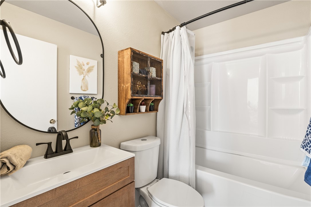 6630 Riding Wind Drive Corpus Christi, TX 78414 - Photo 21 of 40 a bathroom with a sink toilet and shower