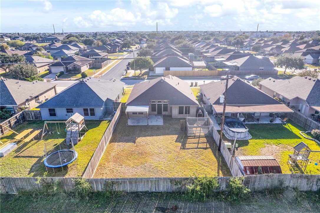 6630 Riding Wind Drive Corpus Christi, TX 78414 - Photo 35 of 40 an aerial view of residential houses with swimming pool