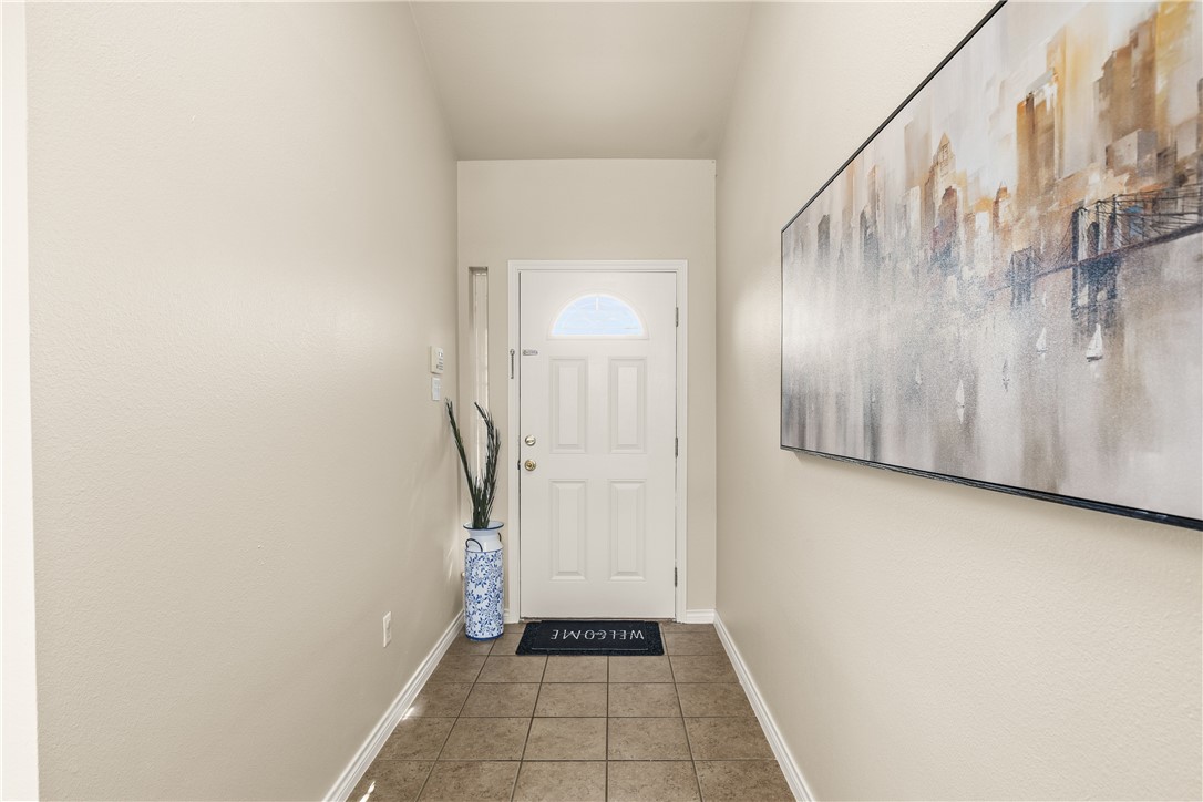 6630 Riding Wind Drive Corpus Christi, TX 78414 - Photo 4 of 40 a view of an entryway with wooden floor