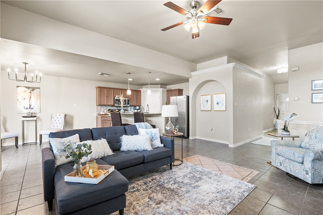 6630 Riding Wind Drive Corpus Christi, TX 78414 - Photo 6 of 40 a living room with furniture and a rug