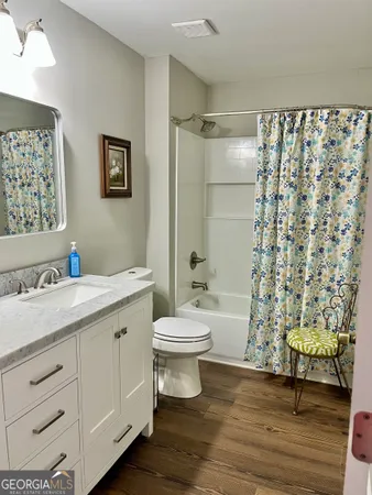 a room with a bed and a window