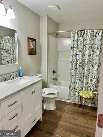 a room with a bed and a window