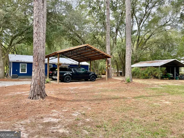 a view of a road with trees