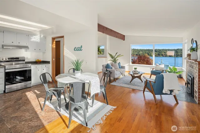 a kitchen with a stove and a refrigerator