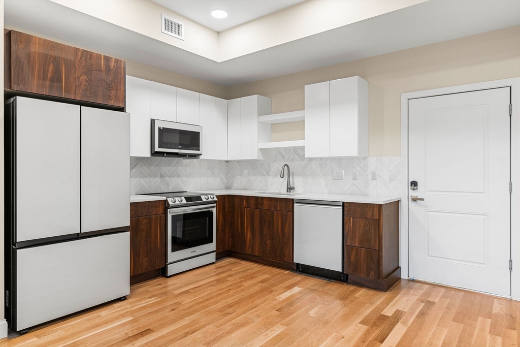 16 Taber Street, Unit 203 Boston, MA 02119 - Photo 3 of 35