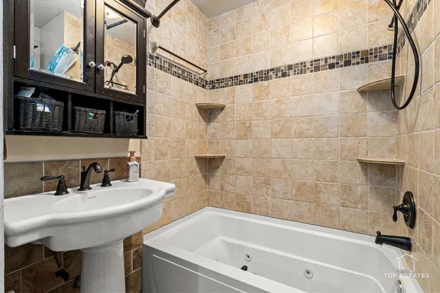 a bathroom with a sink and a bathtub