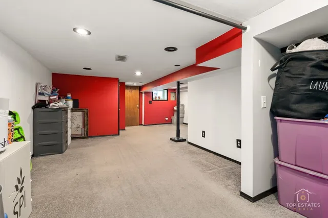 a view of an empty room with closet