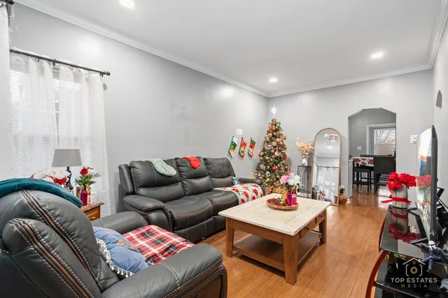 a living room with furniture and a table
