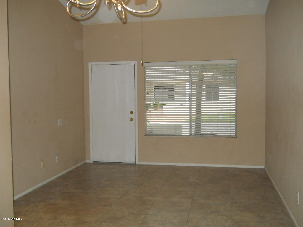 4357 East Carson Road Phoenix, AZ 85042 - Photo 3 of 21 a view of a room with windows