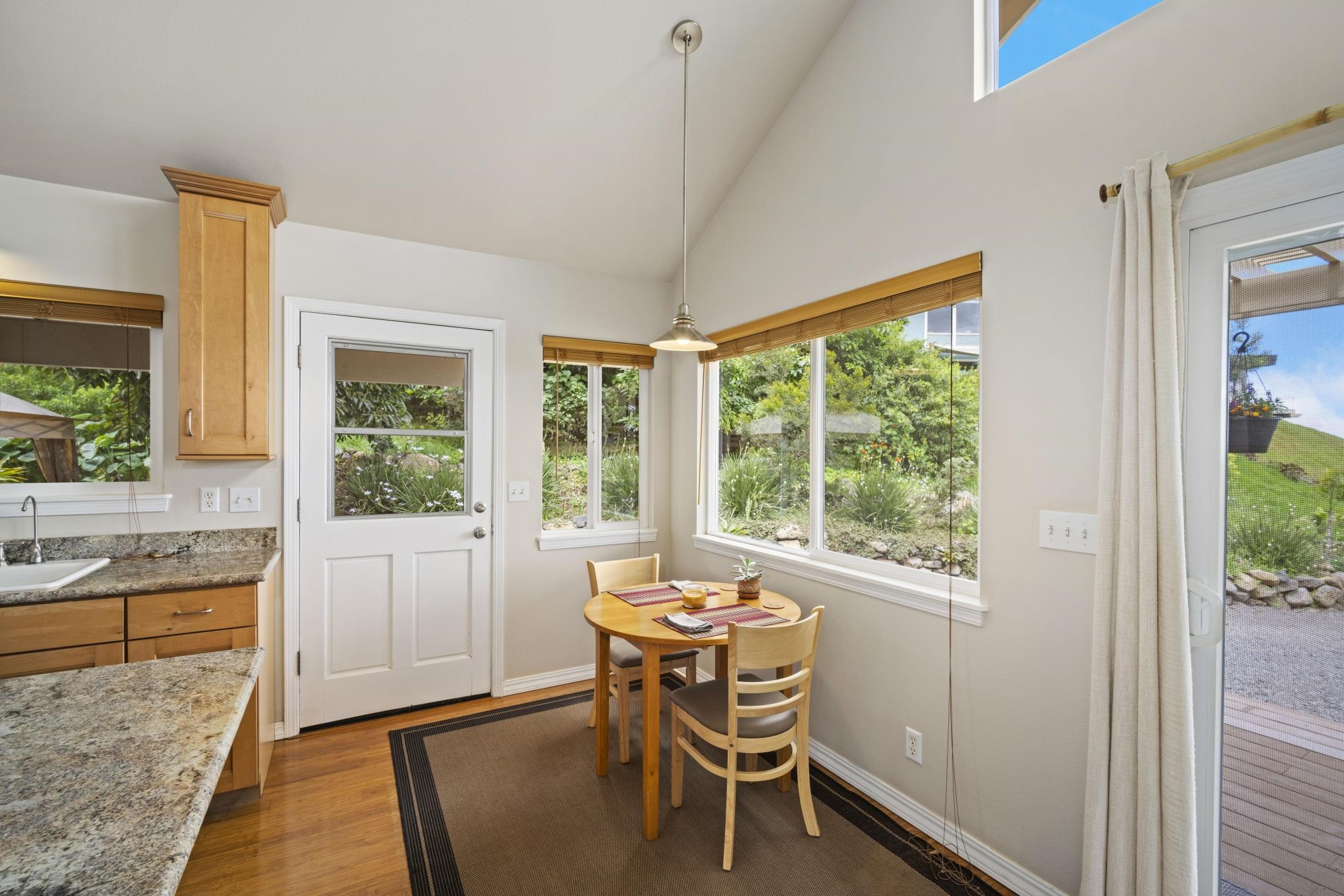 75 Ainakula Road, Unit A Kula, HI 96790 - Photo 16 of 45 a dining room with furniture and window