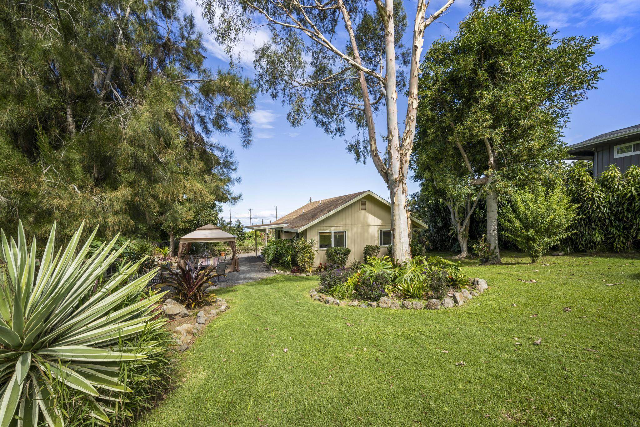 75 Ainakula Road, Unit A Kula, HI 96790 - Photo 27 of 45 a front view of a house with garden
