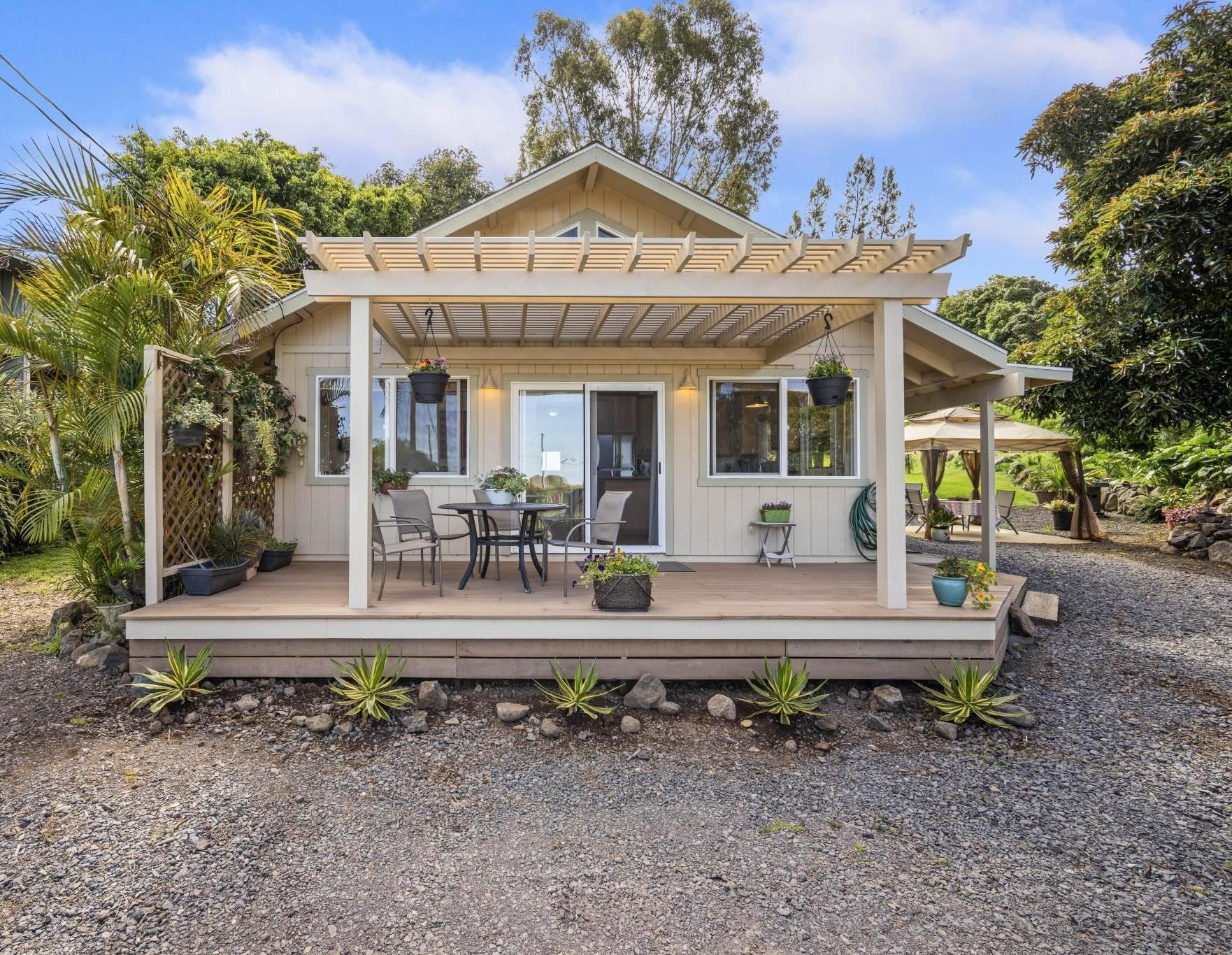 75 Ainakula Road, Unit A Kula, HI 96790 - Photo 3 of 45 a front view of a house with garden