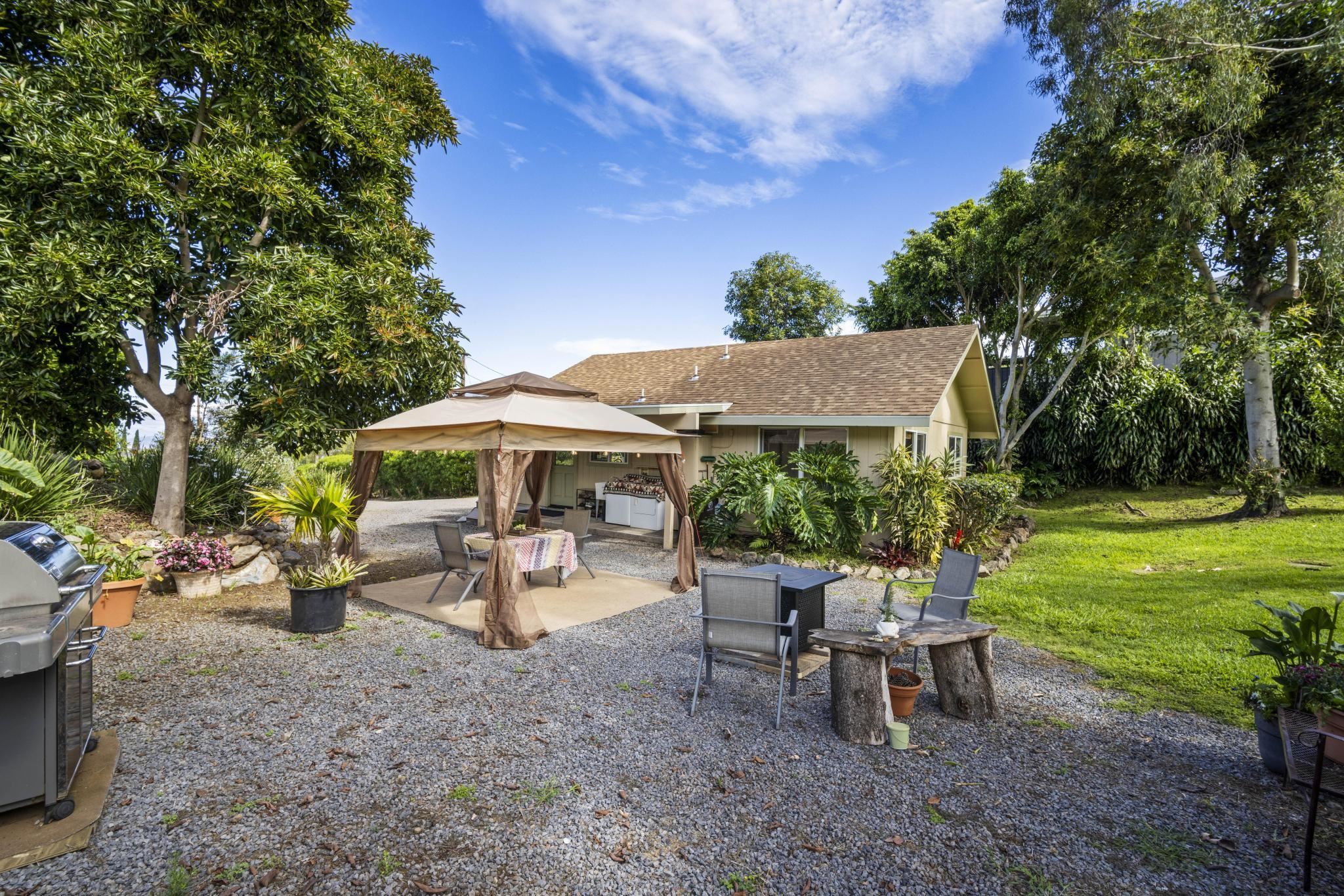 75 Ainakula Road, Unit A Kula, HI 96790 - Photo 4 of 45 a view of a backyard with sitting area