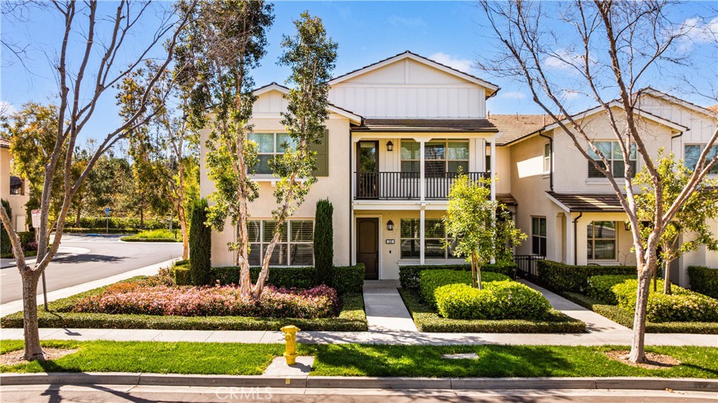 200 Rose Arch Irvine, CA 92620 - Photo 29 of 39 front view of a house with a yard