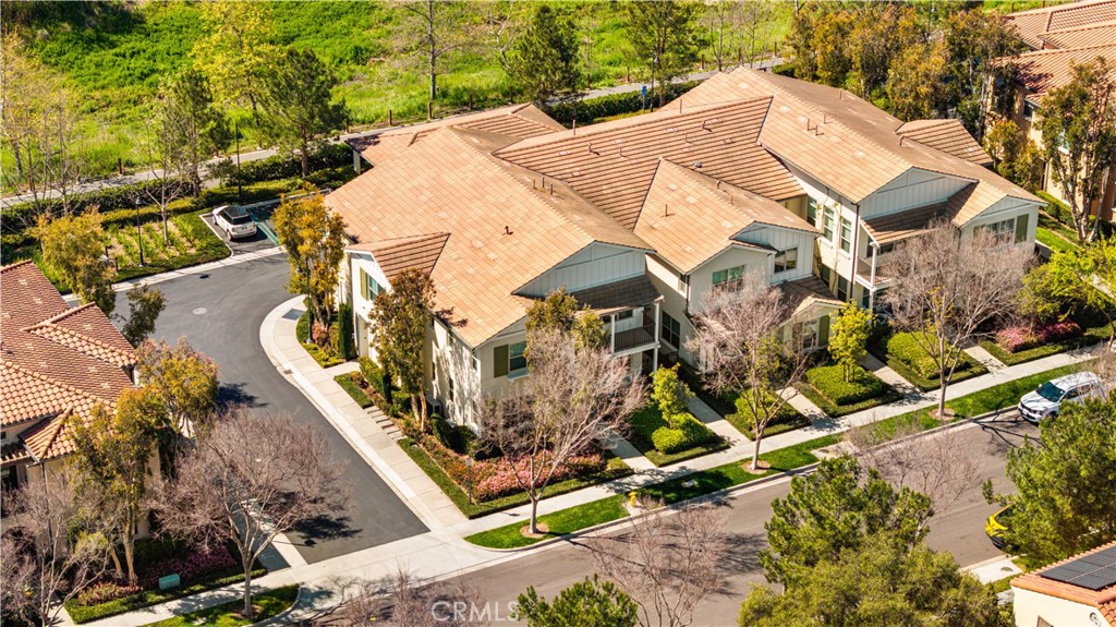 200 Rose Arch Irvine, CA 92620 - Photo 32 of 39 a view of a house with a yard and sitting area