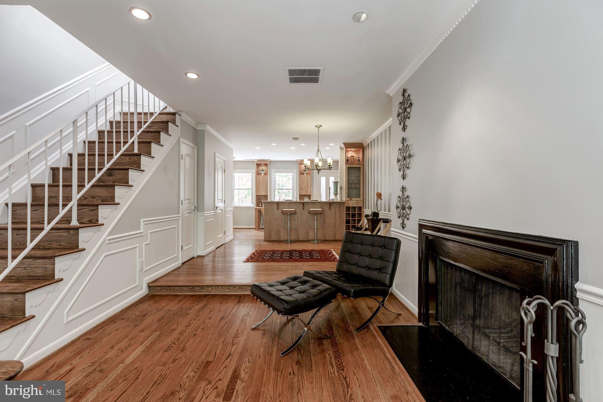 1910 17th Street Northwest Washington, DC 20009 - Photo 4 of 30 a view of a livingroom with wooden floor and furniture