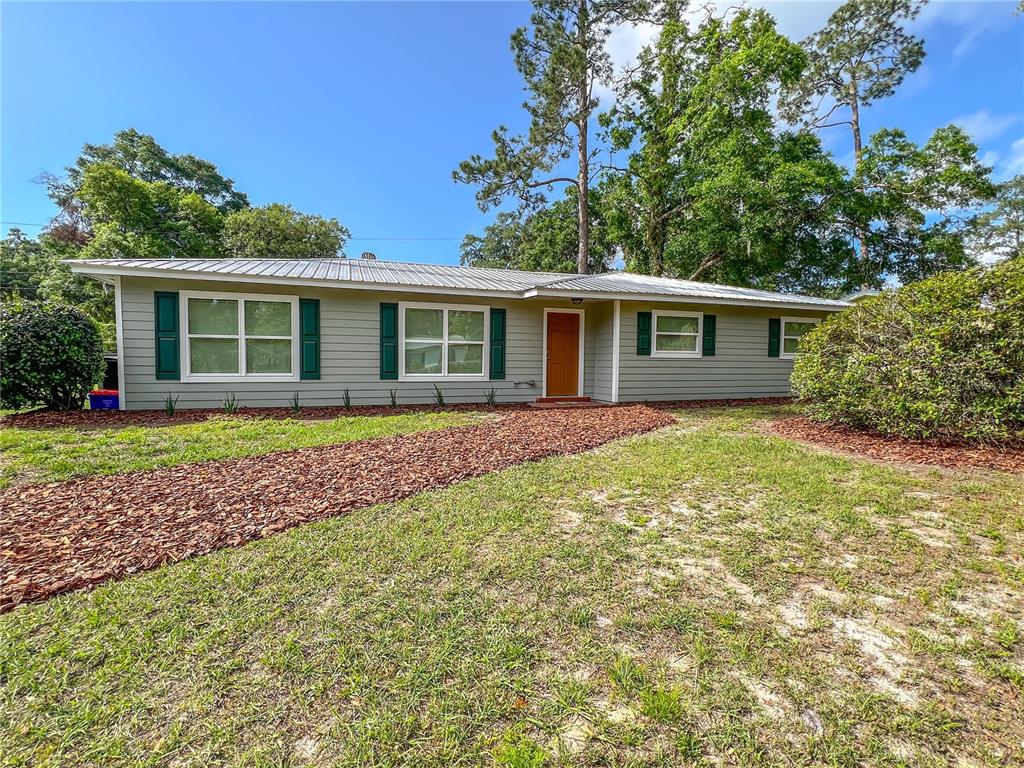 front view of house with a yard