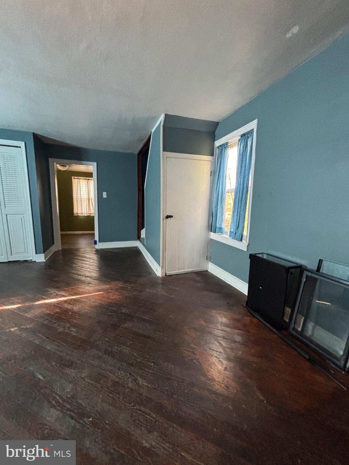 24 North Allentown Road Telford, PA 18969 - Photo 4 of 11 an empty room with wooden floor and windows
