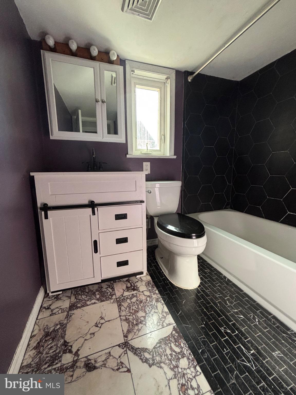 24 North Allentown Road Telford, PA 18969 - Photo 7 of 11 a bathroom with a toilet and a mirror