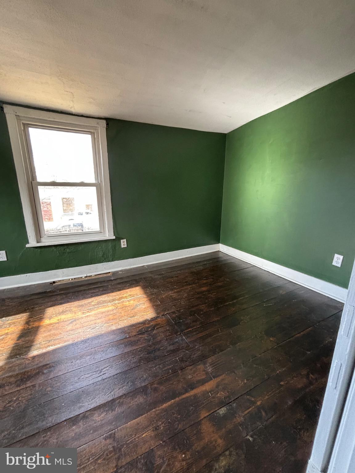 24 North Allentown Road Telford, PA 18969 - Photo 8 of 11 a view of empty room with window and wooden floor