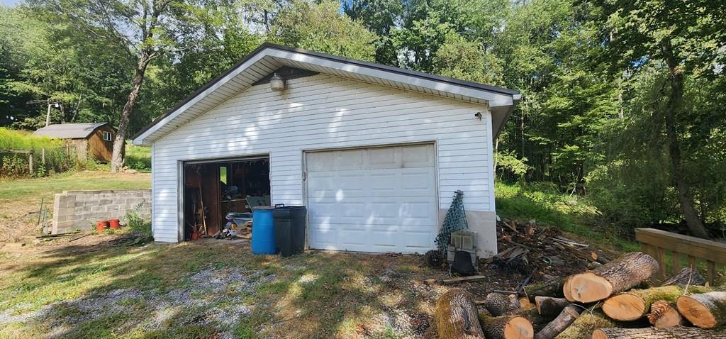 422 St Charles Road New Bethlehem, PA 16242 - Photo 2 of 13 a view of a house with backyard and garden
