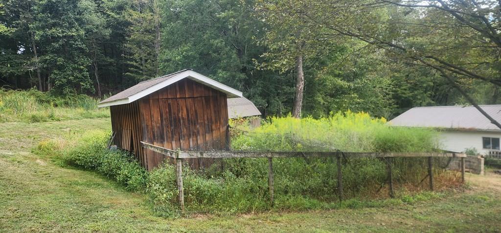 422 St Charles Road New Bethlehem, PA 16242 - Photo 3 of 13 a backyard of a house with lots of green space