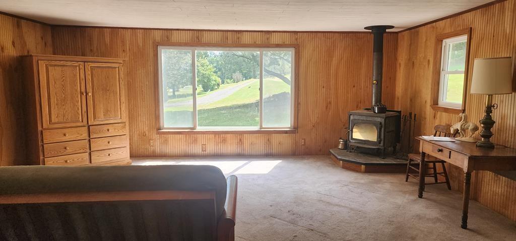 422 St Charles Road New Bethlehem, PA 16242 - Photo 5 of 13 a living room filled with furniture and a large window