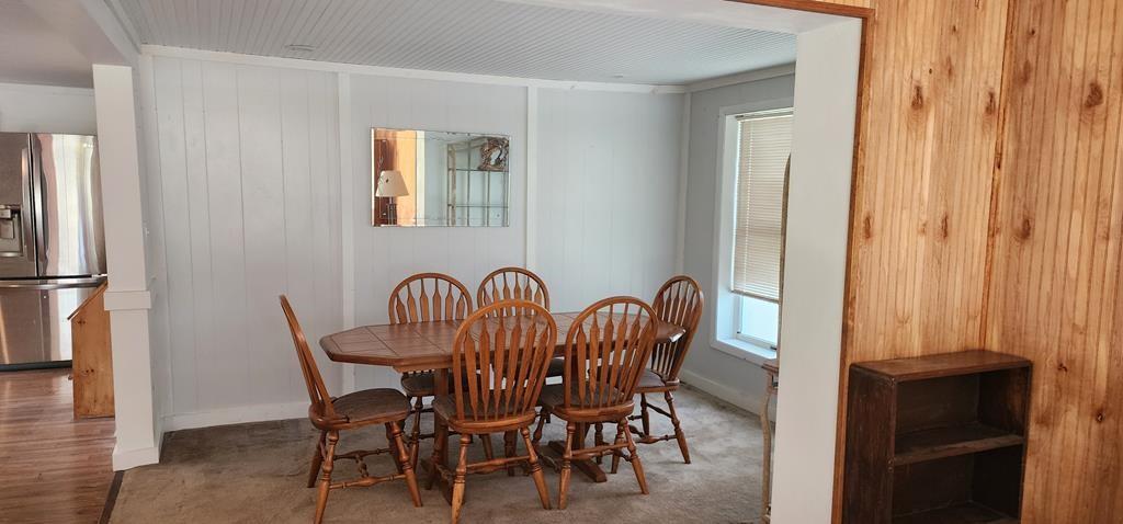 422 St Charles Road New Bethlehem, PA 16242 - Photo 7 of 13 a view of a dining room with furniture and wooden floor