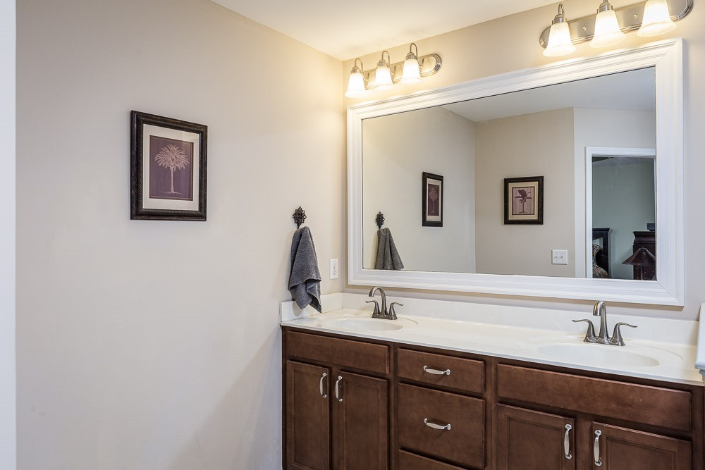 1310 Still Monument Way Raleigh, NC 27603 - Photo 15 of 27 Dual sinks and abundant vanity storage . . . look for the large linen closet too! Master Bath