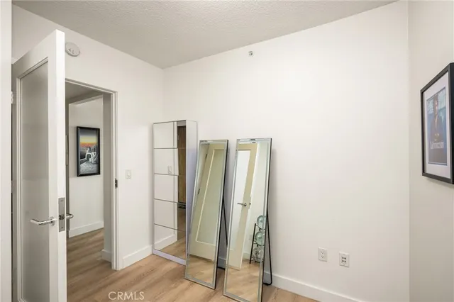 a bathroom with a sink and a glass door shower