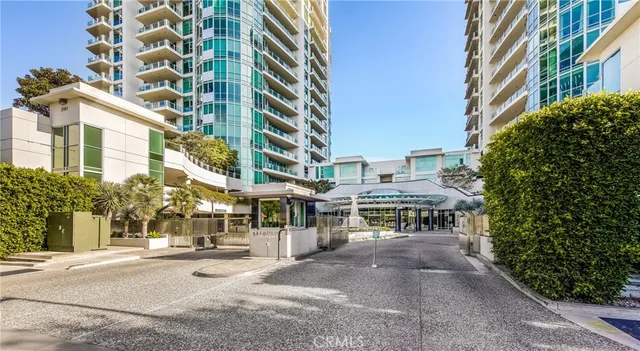 front view of a building with a bench