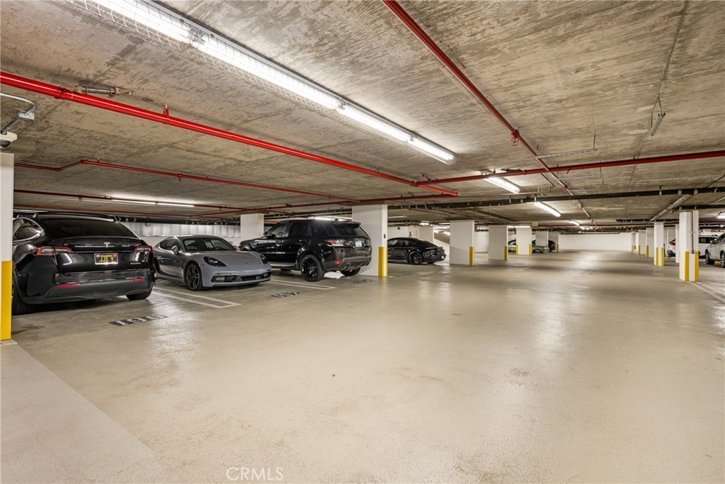 3131 Michelson Drive, Unit 606 Irvine, CA 92612 - Photo 22 of 32 a view of parking garage with cars