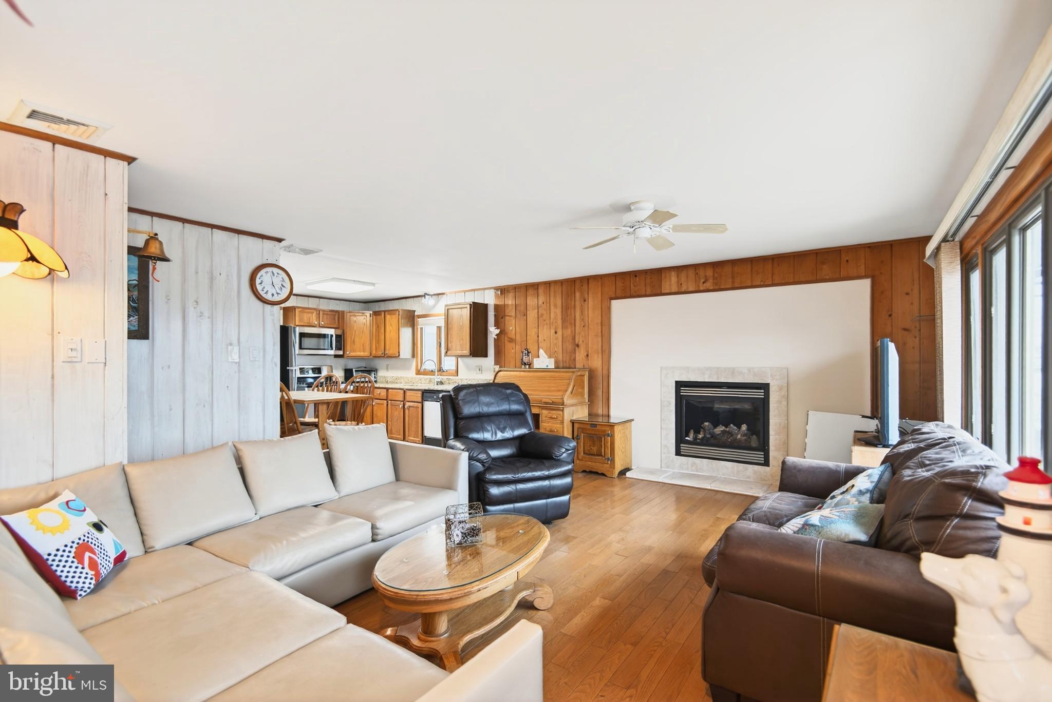 4 Rona Lane Manahawkin, NJ 08050 - Photo 8 of 28 Cozy living space with warm wooden accents.