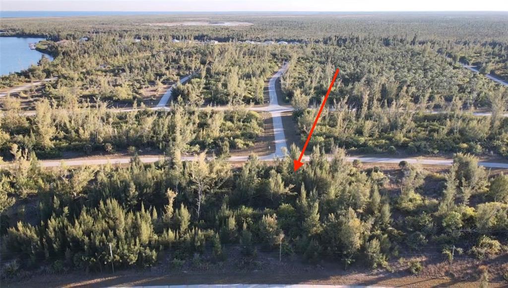 10549 Abello Road Port Charlotte, FL 33981 - Photo 9 of 10 an aerial view of multiple house