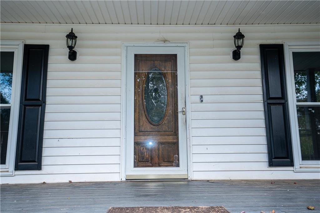 611 Couch Road Dawsonville, GA 30534 - Photo 2 of 26 a view of entryway door