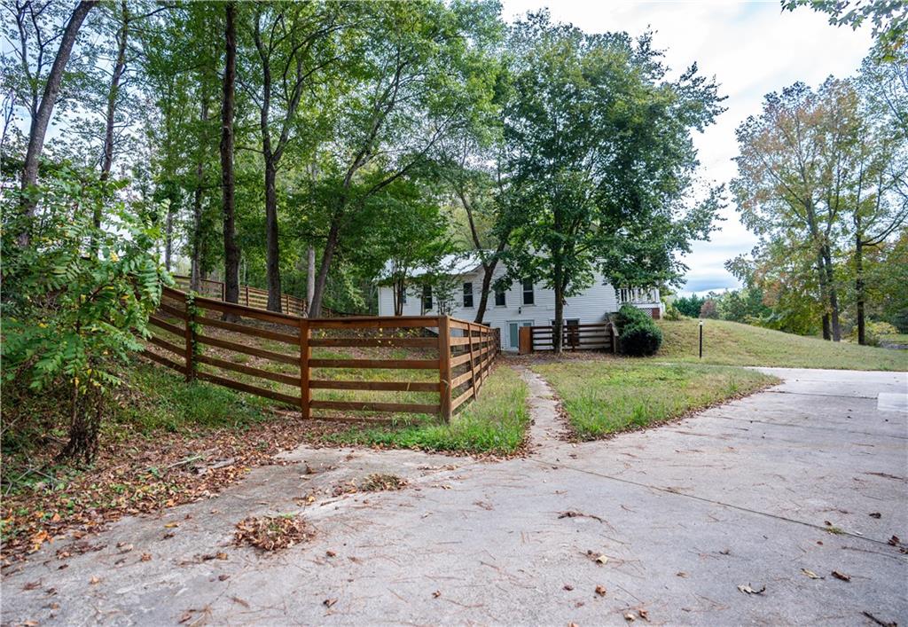 611 Couch Road Dawsonville, GA 30534 - Photo 23 of 26 a park view with large trees