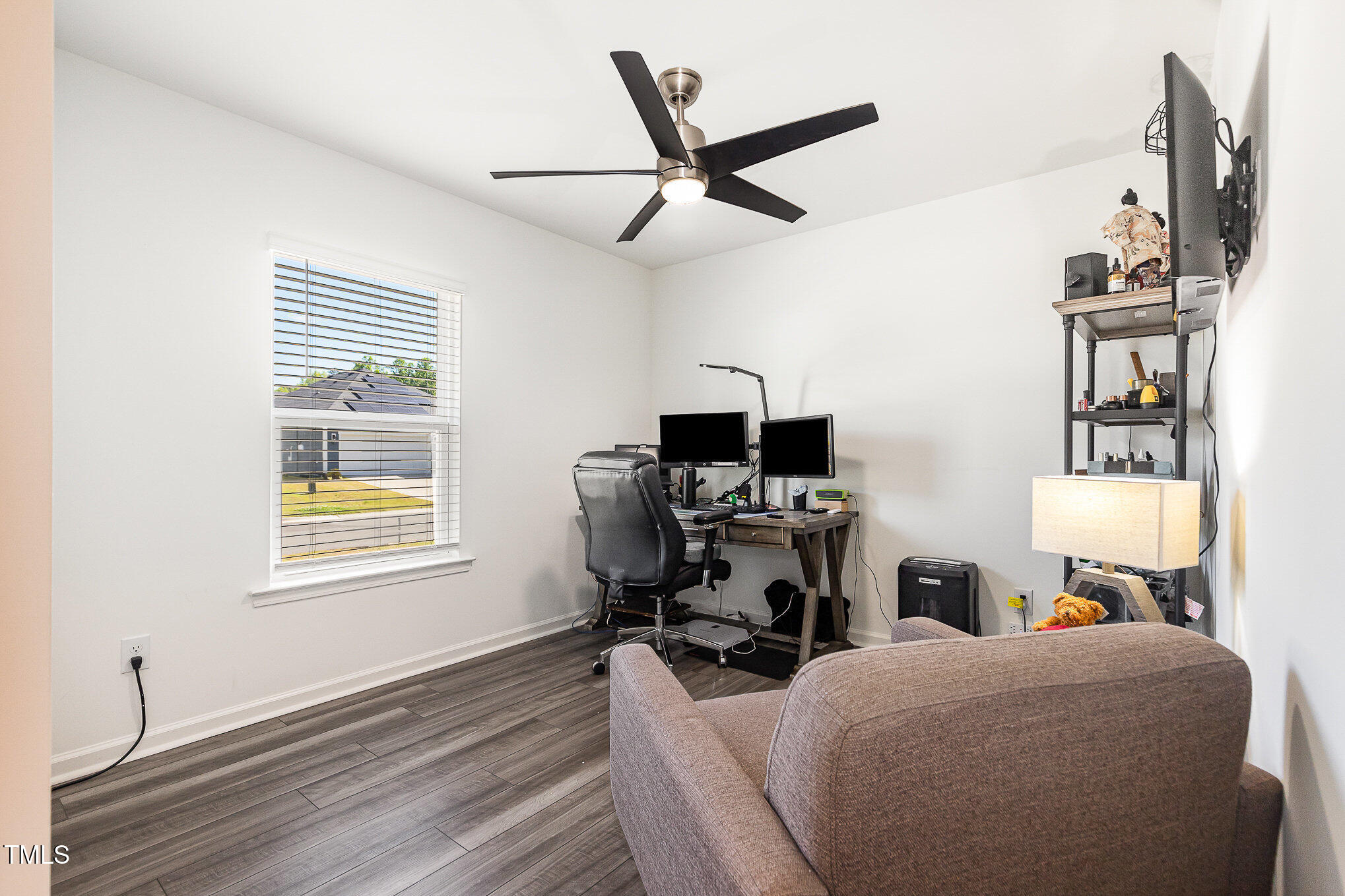 1012 Ringhill Blf Drive Durham, NC 27704 - Photo 4 of 22 a living room with furniture a window and a flat screen tv