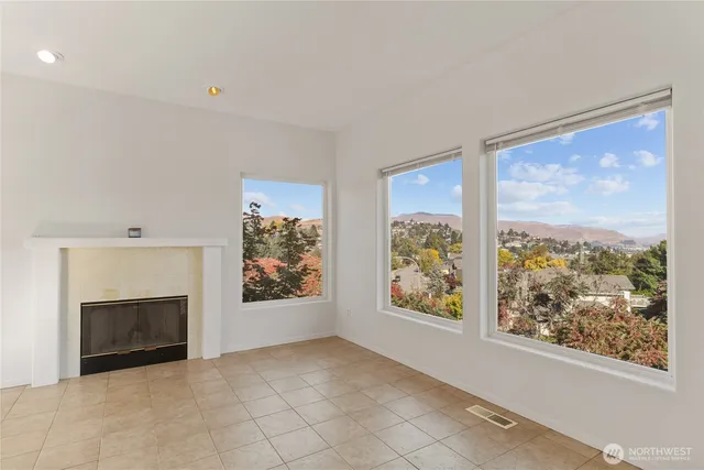 a view of an empty room with a window