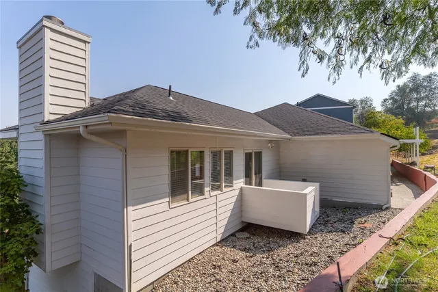 a house view with a garden space