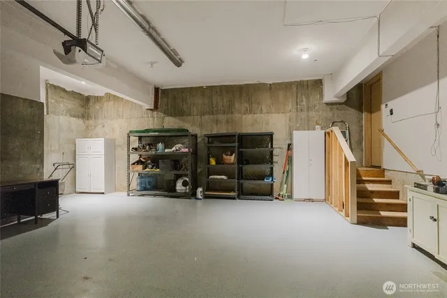 a view of a garage with stairs