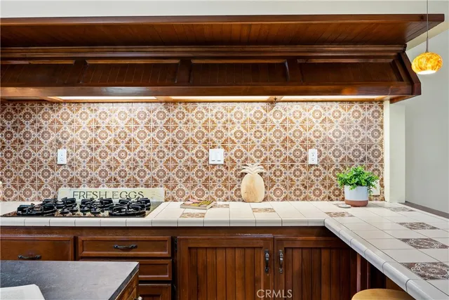 a view of a sink and wooden floor