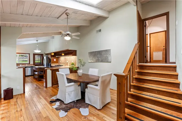 a view of a dining room with furniture