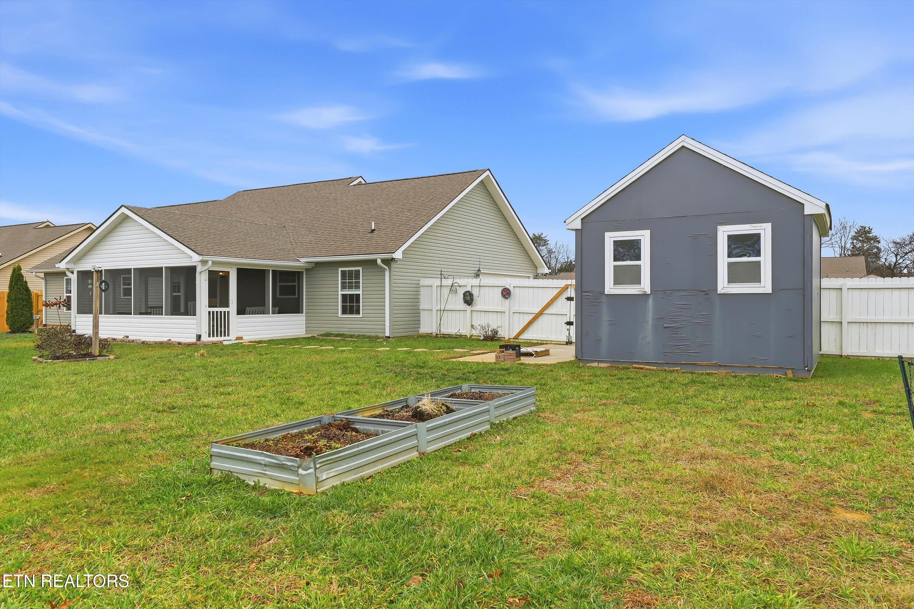 530 Roper Way Walland, TN 37886 - Photo 8 of 29 Shed and raised garden