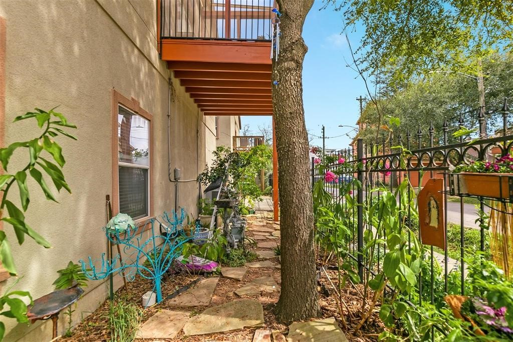 4316 Eli Street Houston, TX 77007 - Photo 17 of 20 a view of a potted plants on a sidewalk next to a building