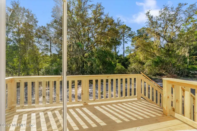 a view of a backyard of the house